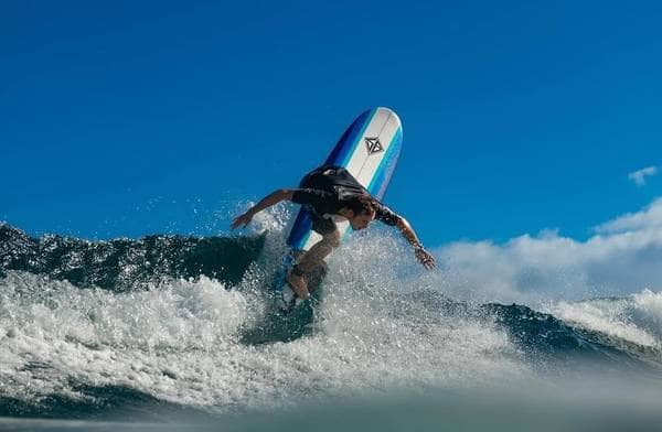 NEW IN THE ORIGINAL PACKAGE 8 FT SURFBOARD W/ LEASH